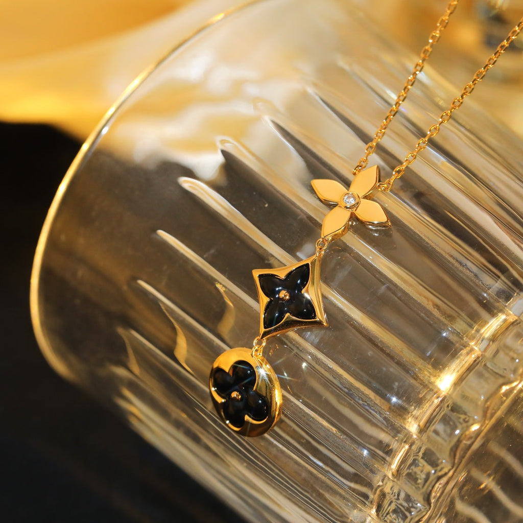 LOUIS VUITTON STAR AND SUN ONYX PINK GOLD NECKLACE