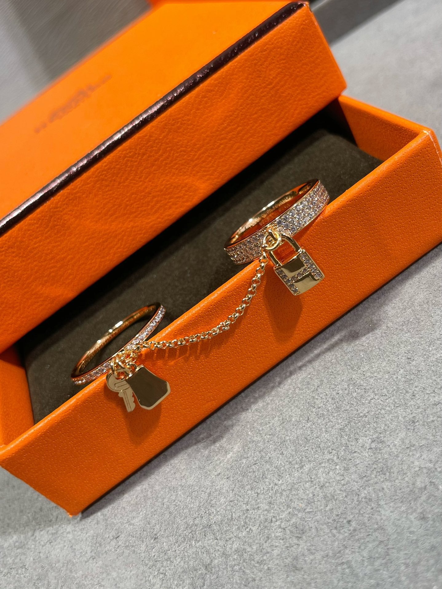 HERMES HM KELLY CLOCHETTE DOUBLE RING IN WITH DIAMONDS